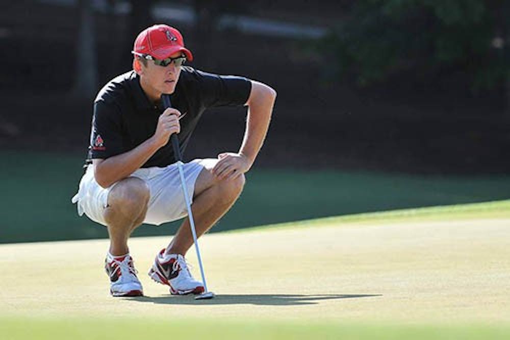 Senior Joe Gasser lines up his put during the NCAA Nationals in Atlanta, Ga. Even though the Cardinals started strong in the rankings, they fell to 24th in overall due to tough course conditions. PHOTO PROVIDED BY BSU ATHLETICS