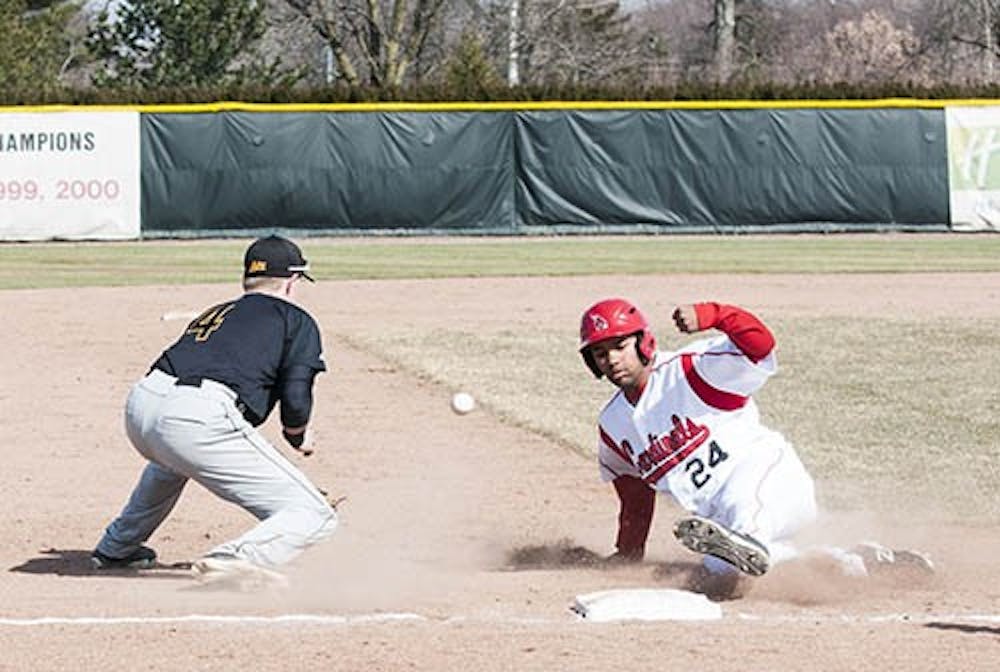 Senior Blake Beemer slides into third against Northern Kentucky on April 3. The Cardinals suffered a 6-5 loss to Miami on Sunday. DN FILE PHOTO JONATHAN MIKSANEK