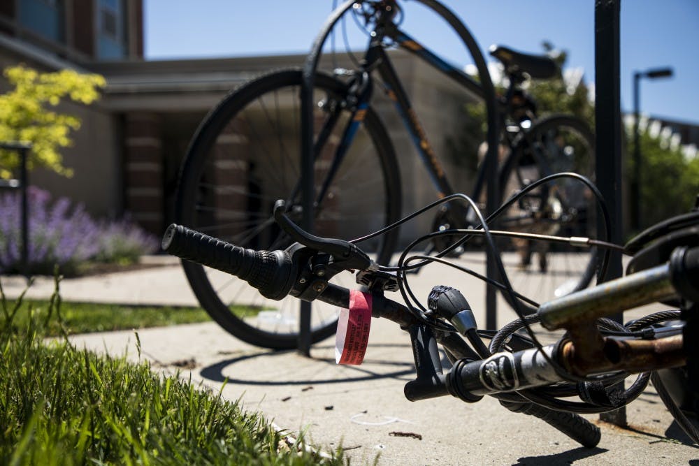 <p>Purchasing Services started tagging abandoned bikes on campus Wednesday, May 23. Bikes are considered abandoned if they are unusable and have rust, bent frames, flat tires or any other missing parts. <strong>Rachel Ellis, DN&nbsp;</strong></p>