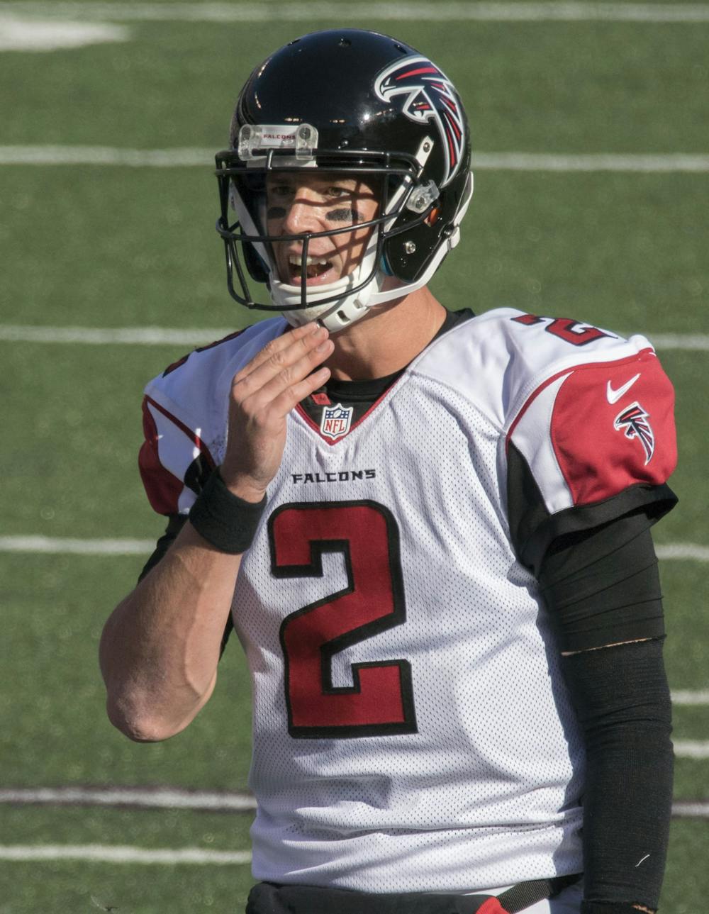 <p>Former Atlanta Falcons quarterback Matt Ryan prepares at the line of scrimmage against the Baltimore Ravens Oct. 19, 2014. Ryan was selected to four Pro Bowls in his 14 seasons with the Falcons. <strong>Photo Credit: Keith Allison, KeithAllisonPhoto.com</strong></p>