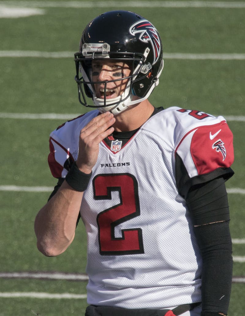Former Atlanta Falcons quarterback Matt Ryan prepares at the line of scrimmage against the Baltimore Ravens Oct. 19, 2014. Ryan was selected to four Pro Bowls in his 14 seasons with the Falcons. Photo Credit: Keith Allison, KeithAllisonPhoto.com