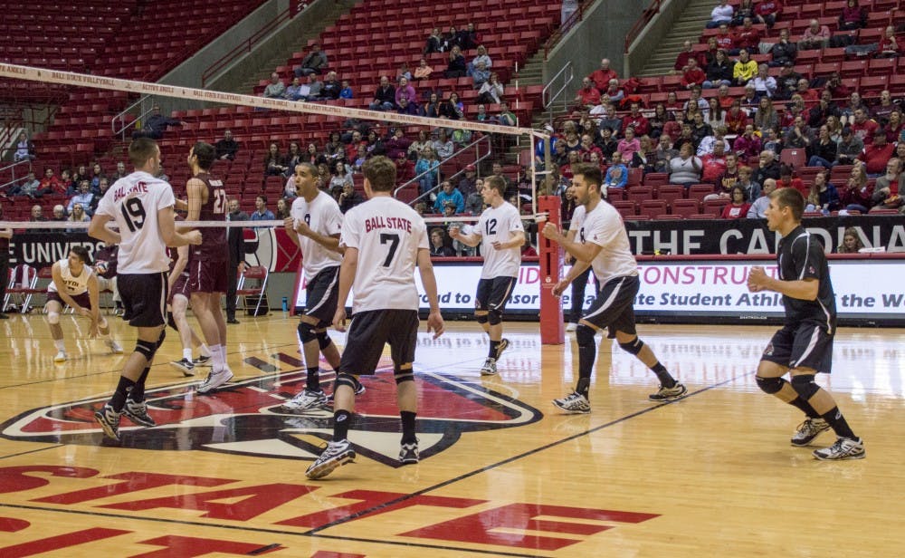 Members of the Ball State men's volleyball team cheer after winning a point during the game against Loyola on March 28 at Worthen Arena. DN PHOTO ALAINA JAYE HALSEY