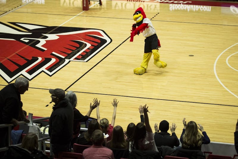 Charlie Cardinal throws t-shirts to a crowd of fans during halftime of the Men’s Volleyball game against Ball State and the Emmanuel Lions, Jan. 6, at John E. Worthen Arena. Admission is free to students and fans in the Muncie community. Grace Hollars, DN