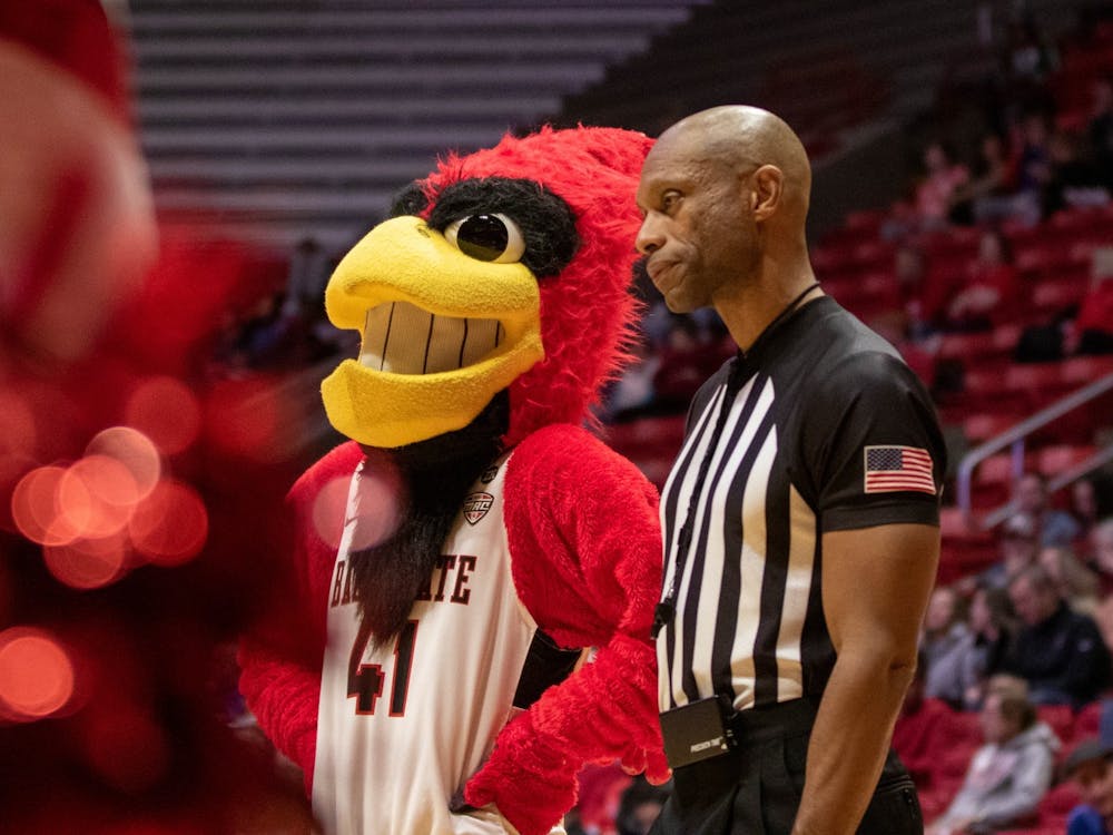 Charlie Cardinal talks with a referee during the Ball State men's basketball game against Loyola University Chicago on Dec. 3, 2019, in John E. Worthen Arena. Ball State lost 70-58. Jaden Whiteman, DN