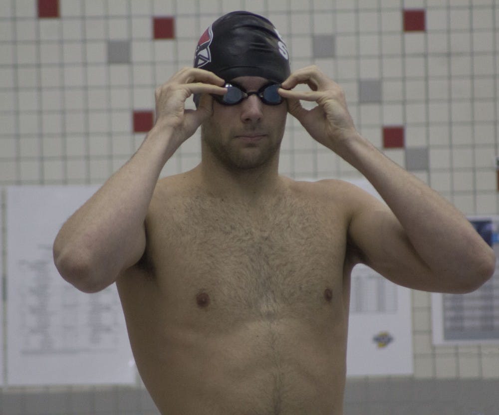 Sophomore Davis Meyn prepares for the men’s 100 yard freestyle at the Butler Invitational Jan. 27, 2019 at Fishers High School. Going into this event, Meyn had a seed time of 46.90 seconds. Patrick Murphy,DN