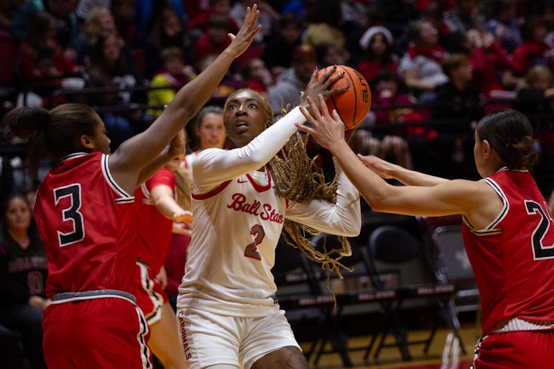 Graduate student Maliyah Johnson looks to score against Davidson College Dec. 5 at Worthen Arena. Johnson had 7 points in the game. Jayce Blane, DN