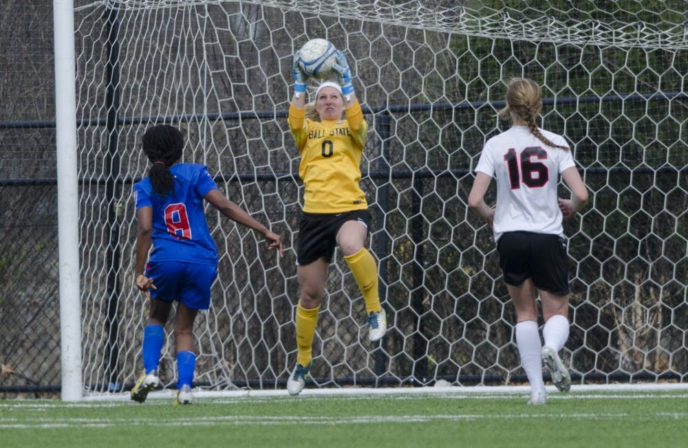 Sophomore goalie Alyssa Heintschel catches an attempt from the Haiti National team during the game on April 12 at the Briner Sports Complex. DN PHOTO BREANNA DAUGHERTY
