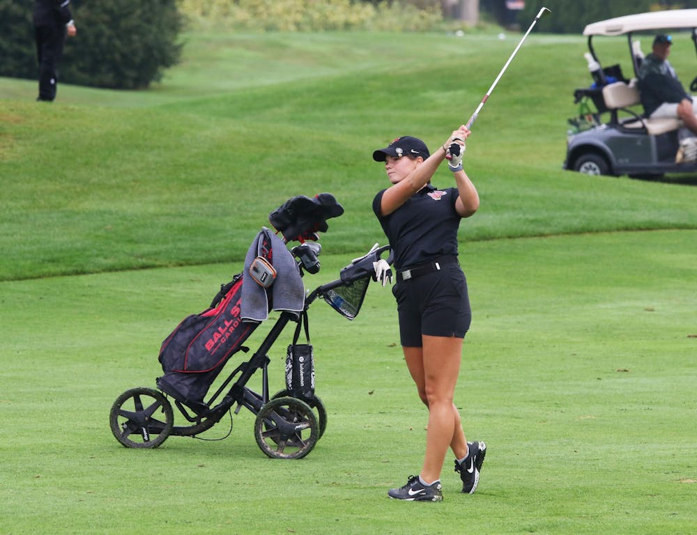 <p>Junior Sabrina Langerak swings a golf club Sep. 18 during the Brittany Kelly Classic at The Players Club. Zach Carter, DN.</p>