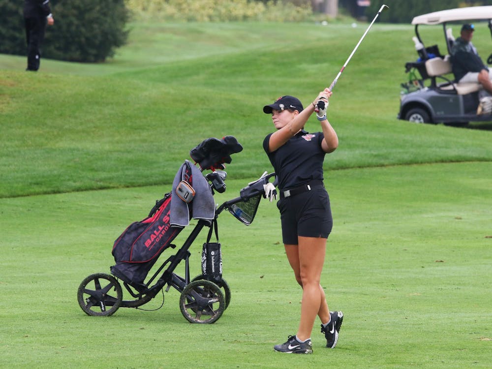 Sophomore Sarah Gallagher swings a golf club Sep. 18 during the Brittany Kelly Classic at The Players Club. Zach Carter, DN.