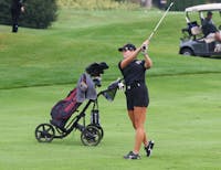 Junior Sabrina Langerak swings a golf club Sep. 18 during the Brittany Kelly Classic at The Players Club. Zach Carter, DN.