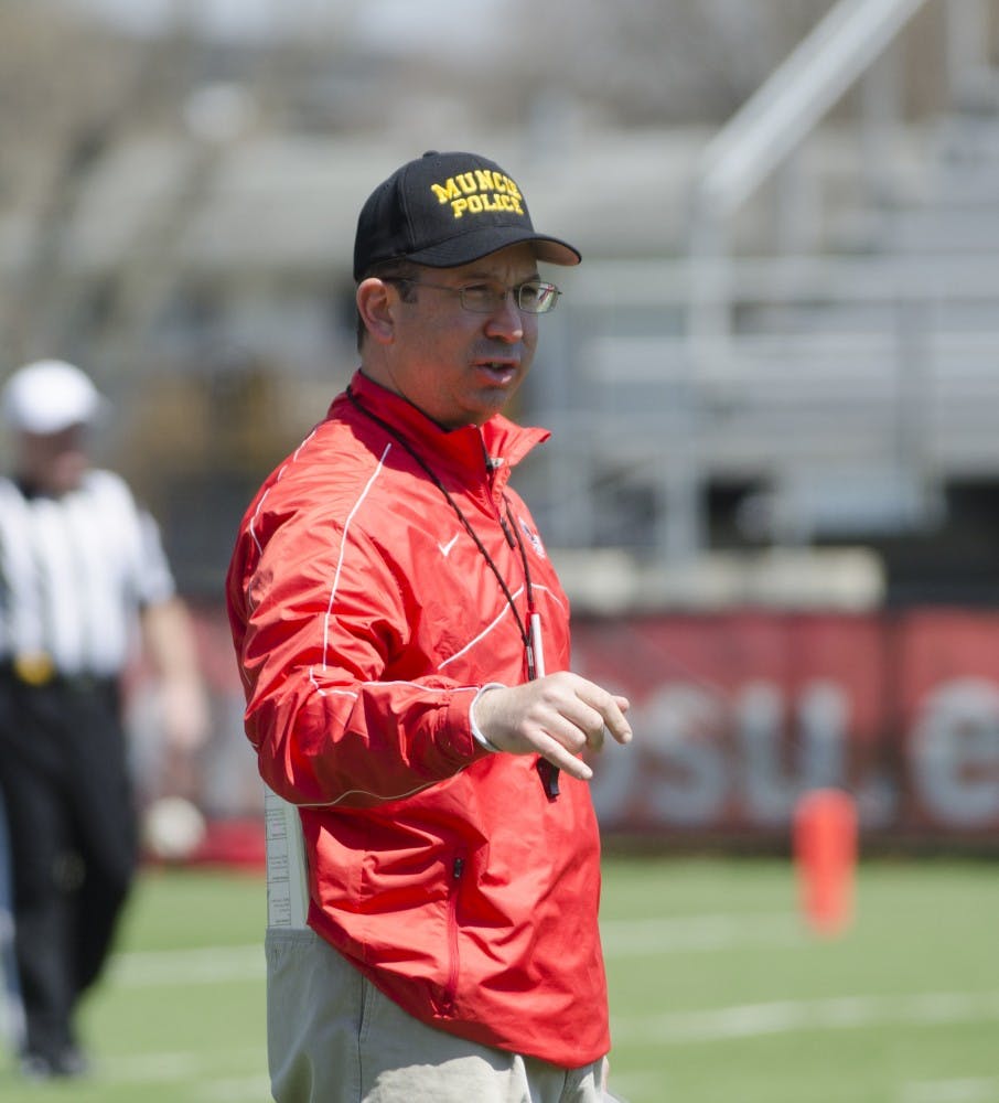 Head coach Pete Lembo coaches during the spring football game on April 19 at Scheumann Stadium. DN PHOTO BREANNA DAUGHERTY 