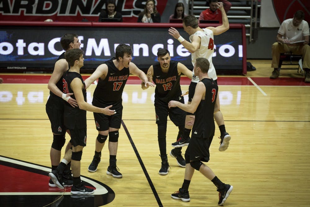 <p>Ball State players jump to a huddle after scoring two points in a row against the Lions, Jan. 6, at John E. Worthen Arena. Ball State swept the Lions, in three straight sets, 16-25, 15-25, 12-25. <strong>Grace Hollars, DN&nbsp;</strong></p>