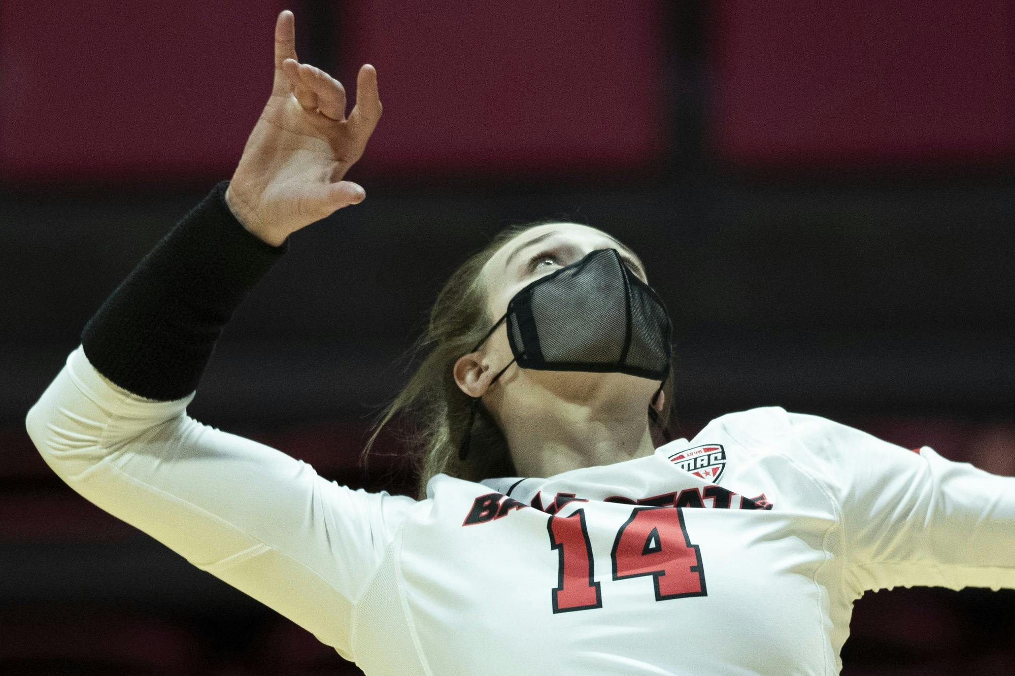 Cardinals senior outside hitter Kia Holder serves the ball during set one against Central Michigan University March 19, 2021, at John E. Worthen Arena. The Cardinals beat the Chippewas 3-2. Jacob Musselman, DN