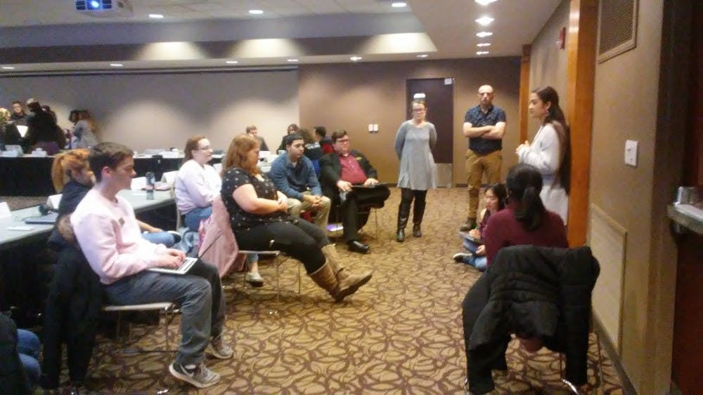 <p>On-Campus Chair Miryam Bevelle speaks to her caucus during a five minute meeting at the Student Government Association (SGA) meeting Wednesday, Feb. 13, 2019, in the L.A. Pittenger Student Center. SGA slate Amplify has now completed 10 out of 16 platform points, with three points still in University Governance.<strong> Charles Melton, DN</strong></p>