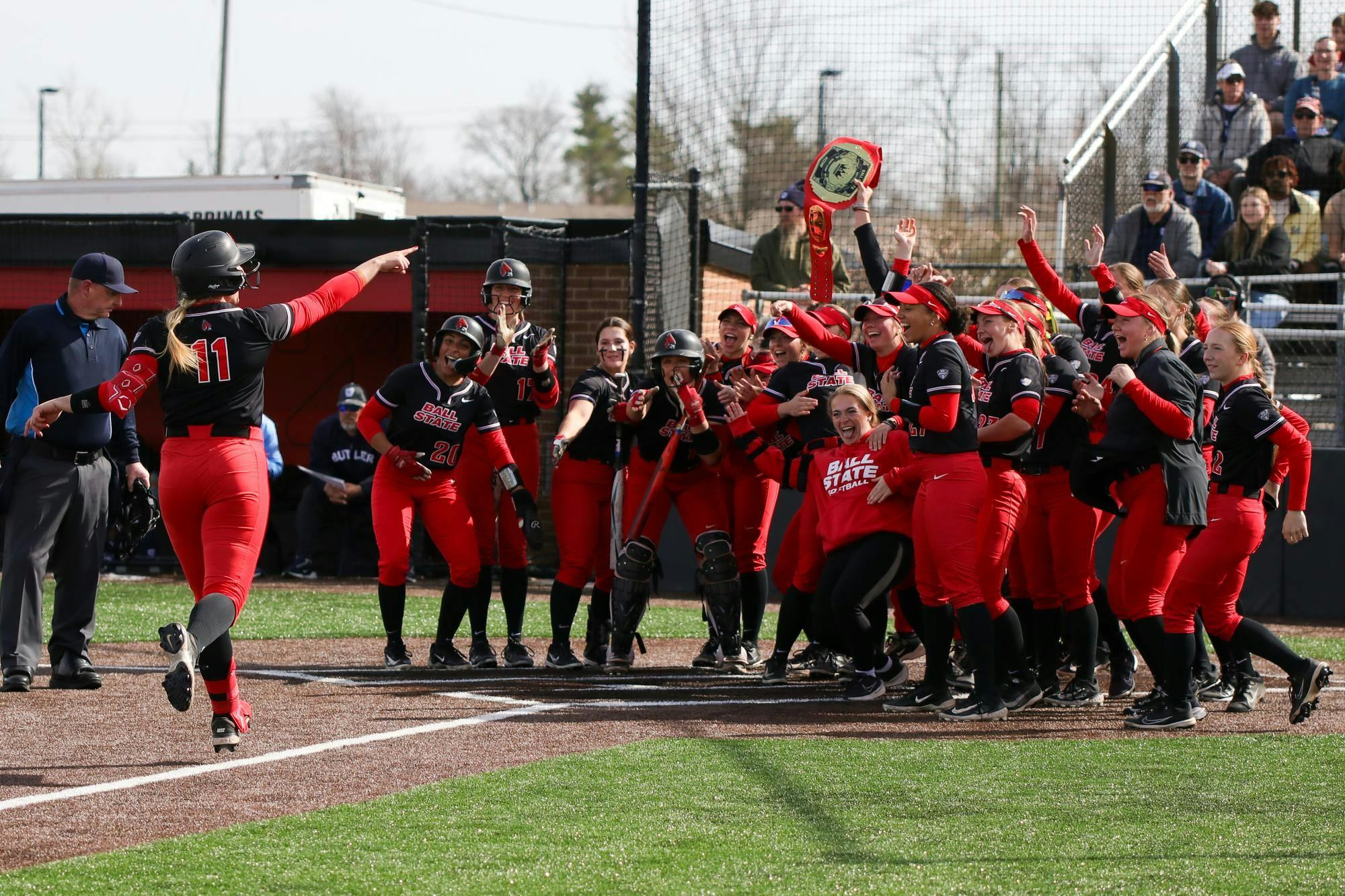 Ball State senior infielder Ella Whitney runs to home plate after scoring a home run March 24 at Ball State Softball Stadium. Whitney has a season high of three runs scored. Adam Jones, DN