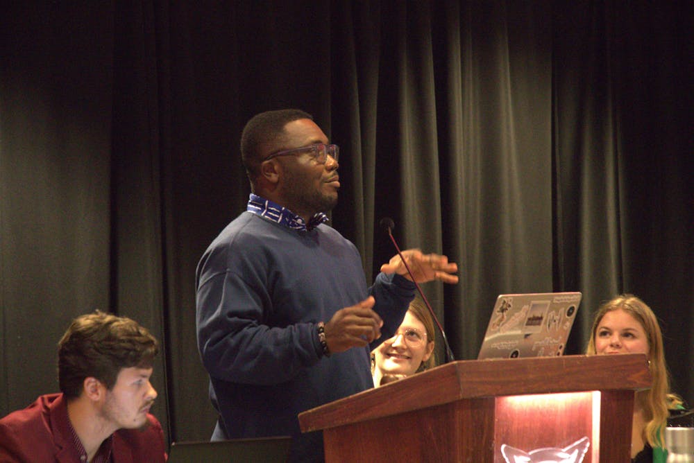 <p>Graduate student Kelvin Gyamfi speaks to why he's an ideal candidate for the collegiate seat of the Student Government Association (SGA) at their senate meeting in the L.A. Pittenger Student Center on Oct. 9. Gyamfi is currently studying organizational and professional communications at Ball State. Shelby Anderson, DN</p>