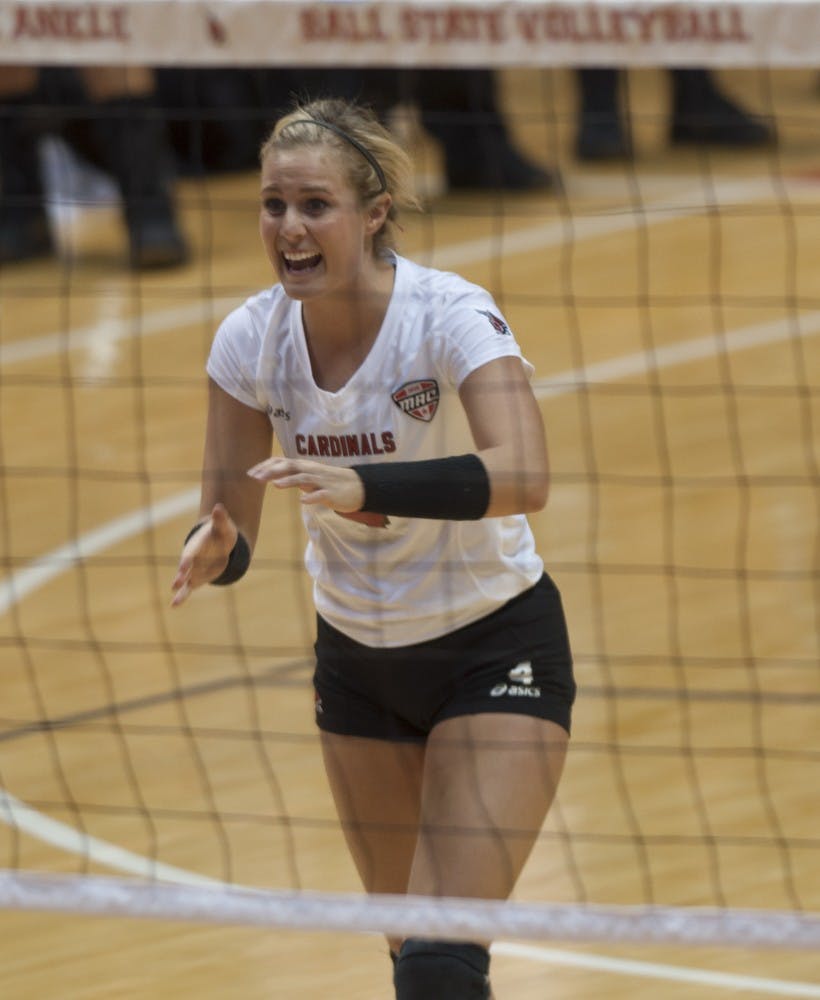 Sophomore defensive specialist Kati Vasalakis moves to celebrate with her team against Bowling Green State University on Oct. 25 at Worthen Arena. Vasalakis had nine digs in the 3-1 loss. DN PHOTO MATT McKINNEY