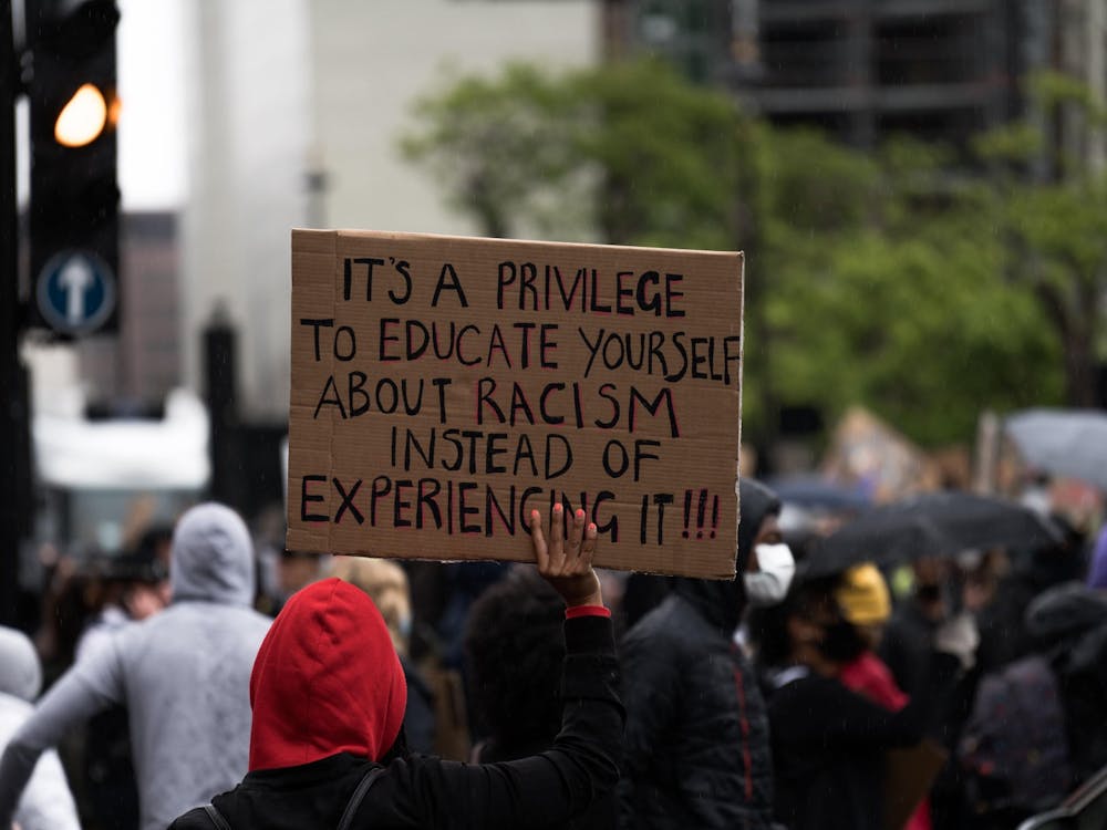 A peaceful protestor holds a sign in support of the notion to remain educated on issues of racial injustice. As student journalists at The Daily News, we take our responsibility to report informative and educational stories on topics of relevance in our society today. Unsplash, Photo Courtesy
