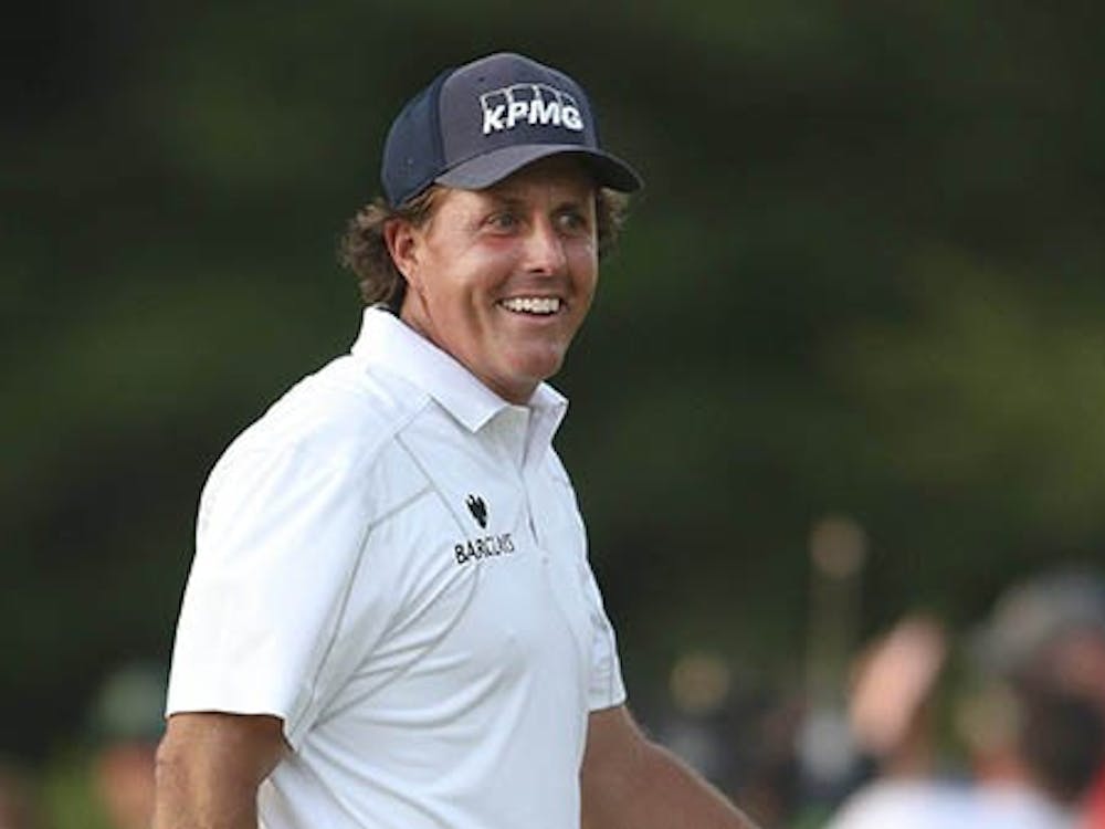 Phil Mickelson walks on the 18th green during the 2013 U.S. Open at the Merion Golf Club East Course in Ardmore, Pa., on Saturday. Mickelson was the first runner-up in the U.S. Open and has been for a record six times. MCT PHOTO