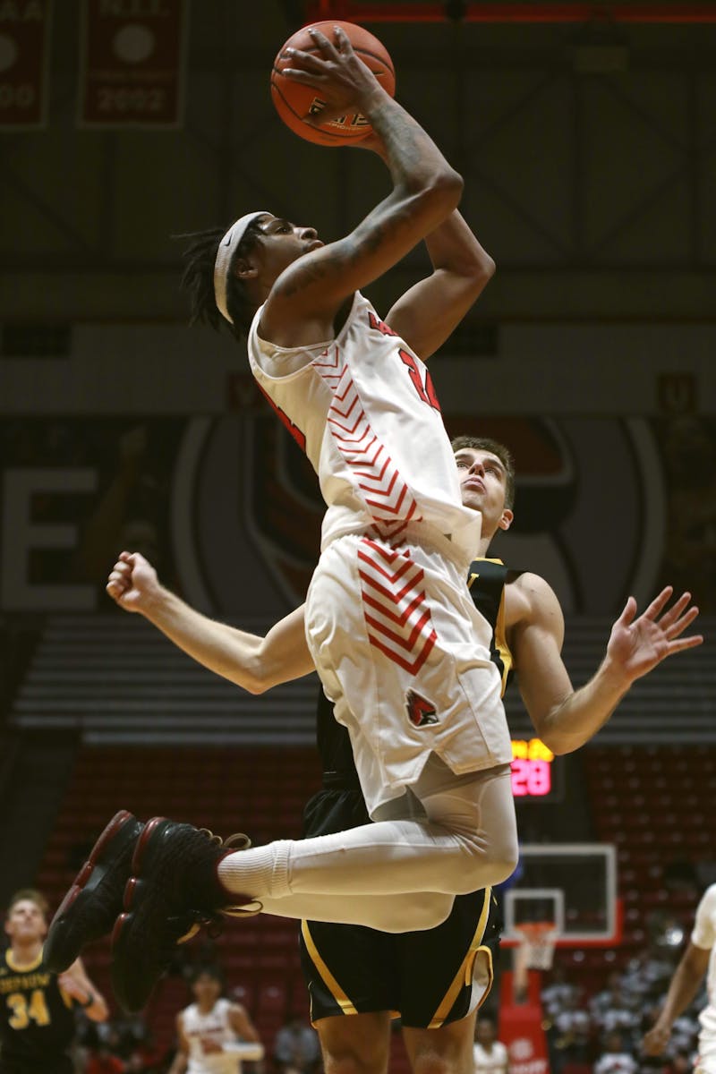 Junior guard Jalen Windham jumps to go for a basket in an exhibition game against DePauw Oct. 29 at Worthen Arena. Windham scored 12 points during the game. Amber Pietz, DN