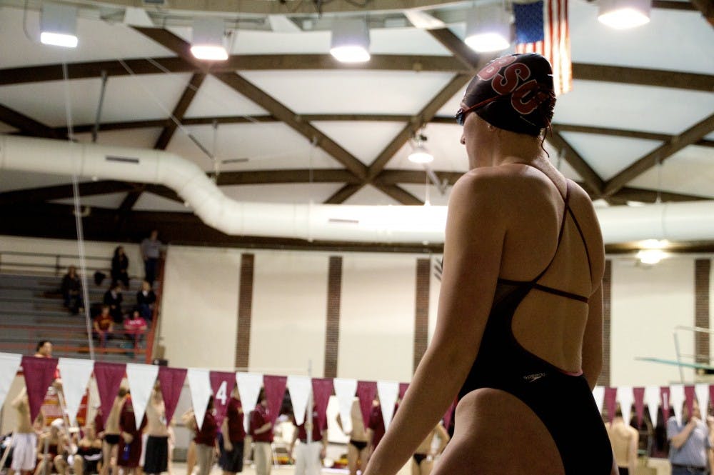 <p>Swimmers prepare to swim in their events during the swim and dive meet against IUPUI and the University of Milwaukee on Jan. 23 at Lewellen Pool. DN PHOTO ALAINA JAYE HALSEY</p>