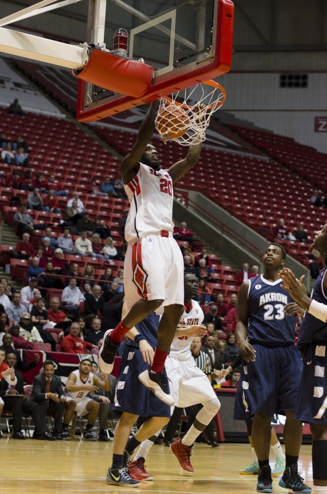 Senior forward Chris Bond dunks the ball in the second half against Akron on Jan. 8 at Worthen Arena. Bond scored 18 points in the game. DN PHOTO BREANNA DAUGHERTY