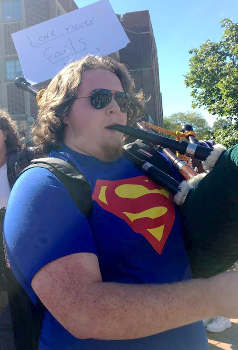 Ball State student fights preachers by playing bagpipes