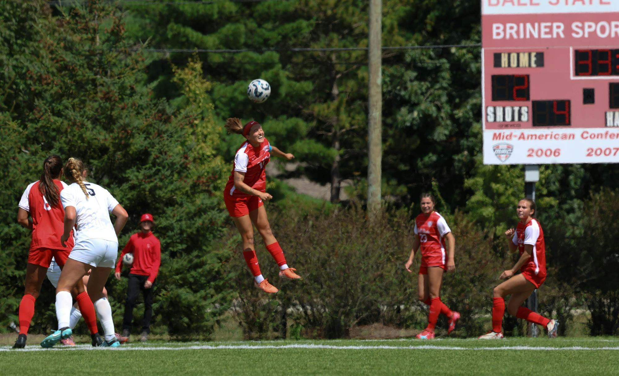 Ball State women's soccer player jumps to head the ball Sep. 7 at Briner Sports Complex. Anna Evilsizor, DN