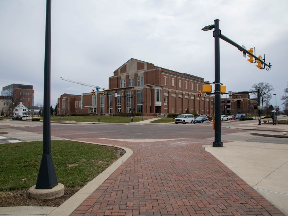 The scramble light sits at the intersection of North McKinley and West Riverside avenues and will chirp to let pedestrians cross in any direction. The scramble light is most crowded after afternoon classes dismiss. Jaden Whiteman, DN File