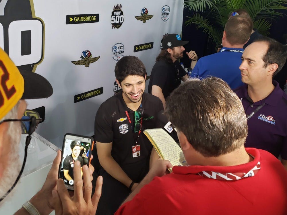 <p>Kyle Kaiser talks with the media in the North Chalet of Pagoda Plaza May 23 for Indy 500 Media Day. Kaiser qualified 33rd for the race just four days earlier. <strong>Zach Piatt, DN</strong></p>