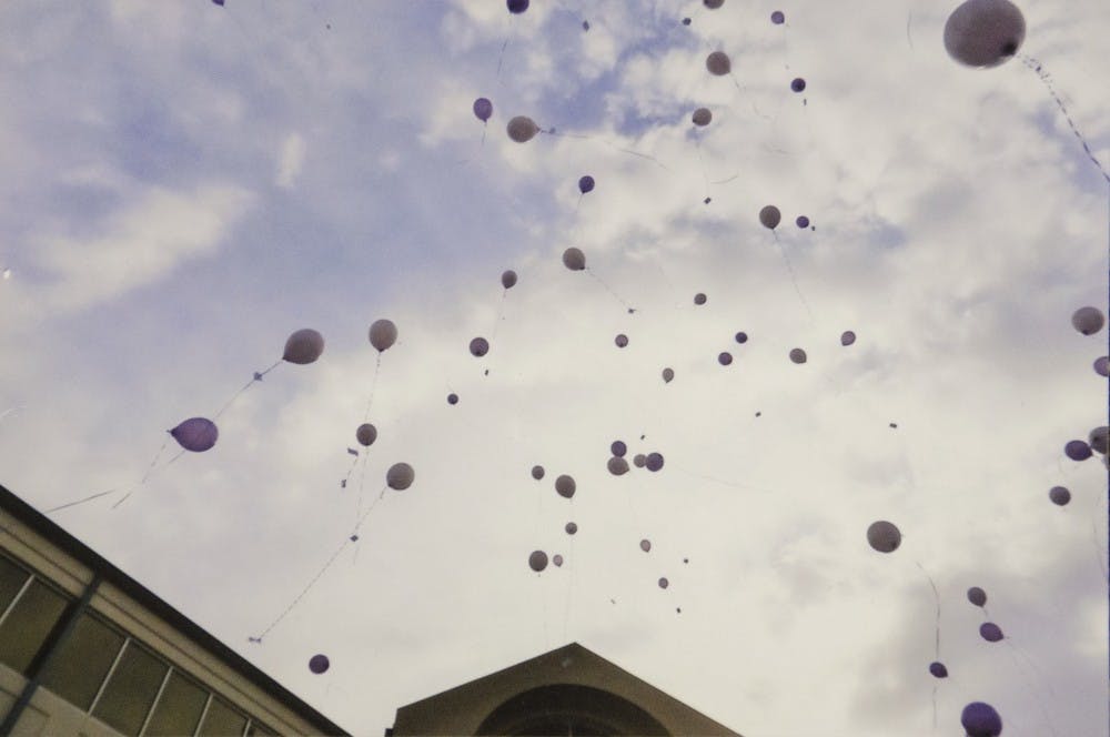 At the 2014 Delaware County Balloon Launch for National Crime Victims' Rights Week, families let balloons free in the sky at Muncie City Hall. The balloons were released in remembrance of loved ones who have passed away as a result of violent crime. PHOTO PROVIDED BY MUNCIE VICTIM ADVOCATE