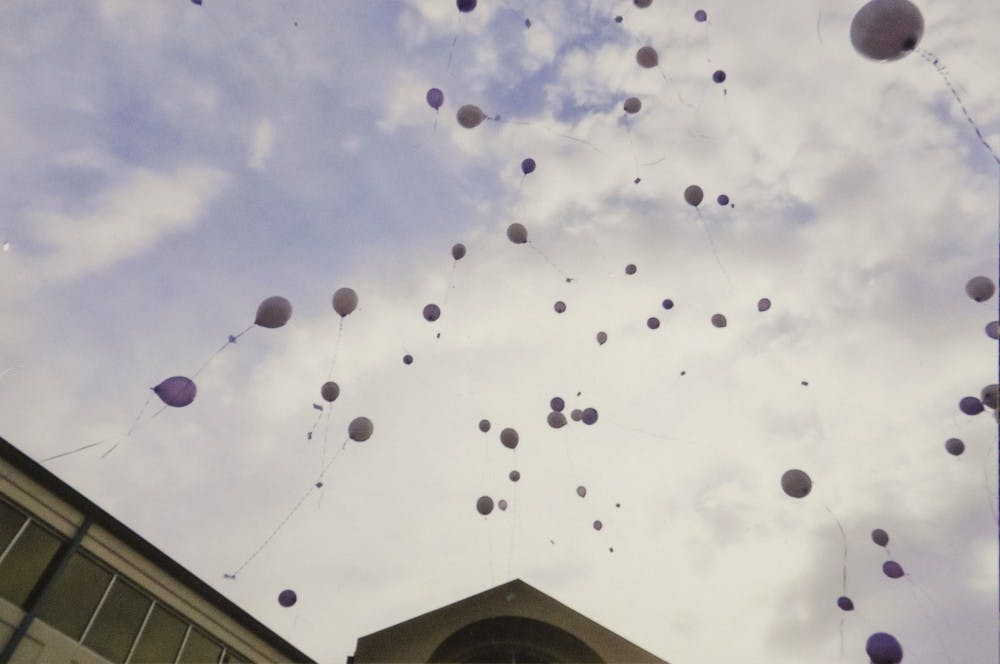 <p>At the 2014 Delaware County Balloon Launch for National Crime Victims' Rights Week, families let balloons free in the sky at Muncie City Hall. The balloons were released in remembrance of loved ones who have passed away as a result of violent crime. <em>PHOTO PROVIDED BY MUNCIE VICTIM ADVOCATE</em></p>