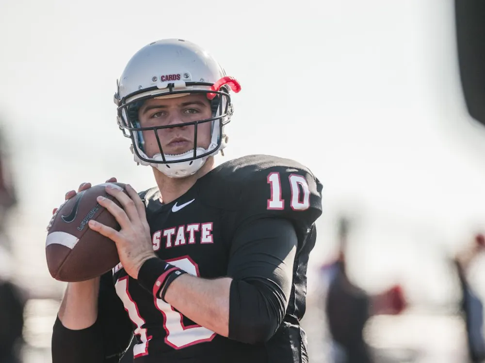 Senior quarterback Keith Wenning practices on the sidelines. DN PHOTO JONATHAN MIKSANEK
