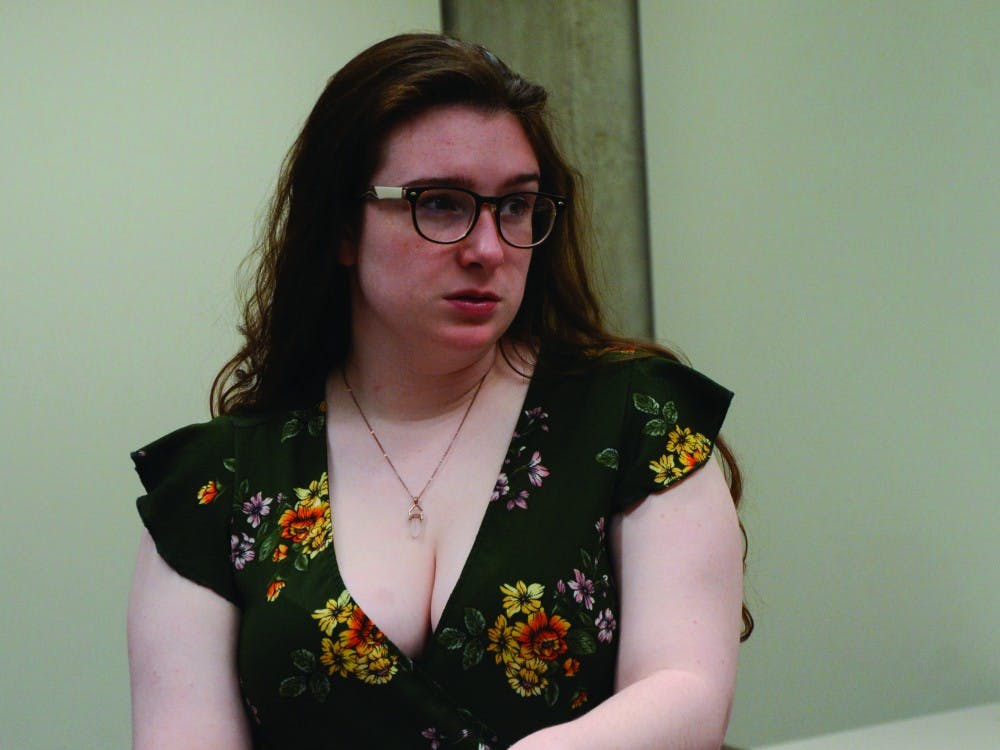 Junior acting major Wilhelmena Dreyer performs a scene as her character, Lila, a young Jewish woman, during a rehearsal for "This is the Way" April 8, 2019, in Bracken Library. At the beginning of this scene in the play, Lila was crying on the floor at her Jewish Community Center before one of her classmates from school, Matthew, approached her. Nicole Thomas, DN