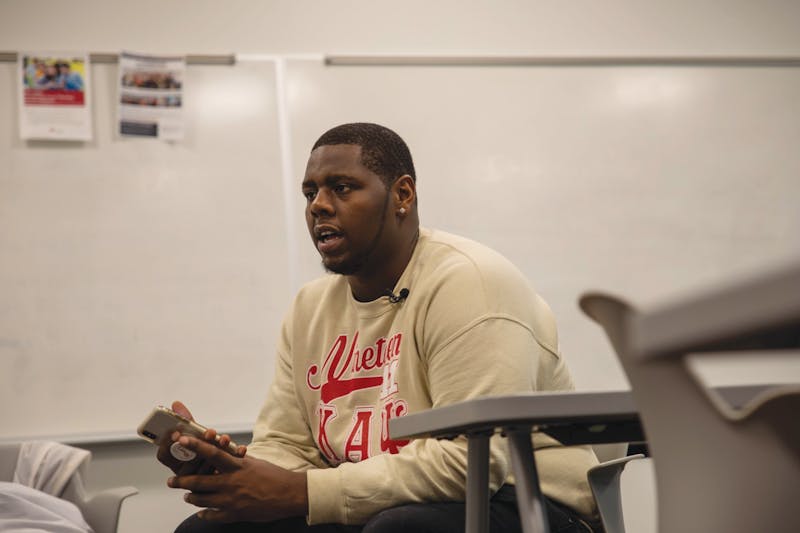 Senior business administration major, Sultan "Mufasa" Benson, gets interviewed by NewsLink Indiana Jan. 22. 2020, in a Whitinger Business Building classroom. Benson's Marketing 310 professor, Shaheen Borna, called the police on him after he refused to change seats because he was charging his laptop. Jaden Whiteman, DN
