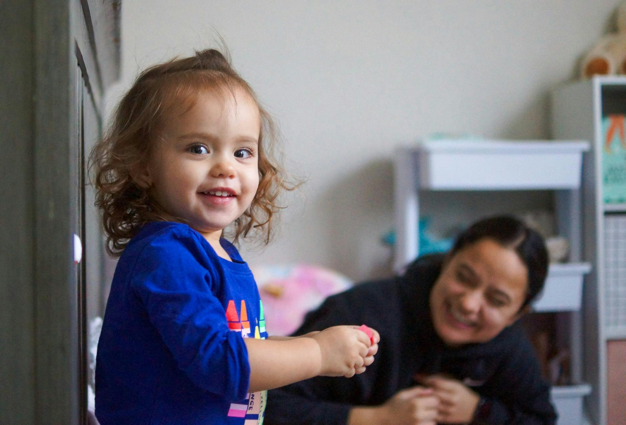 Graduate student Jada Cooper looks through work emails with her daughter Emerysn at their kitchen table at home in Muncie Jan. 5. When Jada pulls out her laptop, Emerysn usually likes to help, which hinders her ability to get work done. Daniel Kehn, DN
