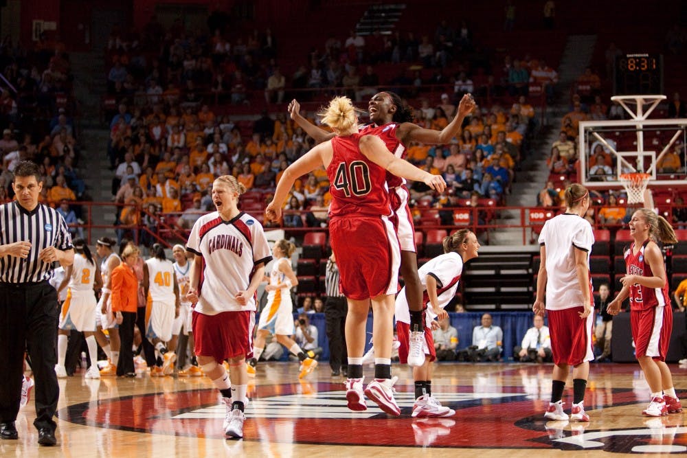 Amber Crago celebrates with a teammate after No. 12 Ball State upset No. 5 Tennessee in the first round of the 2009 NCAA Division I Women's Basketball Tournament on Mar. 22, 2009 at E.A. Diddle Arena. Ball State Photo Services, Photo Provided