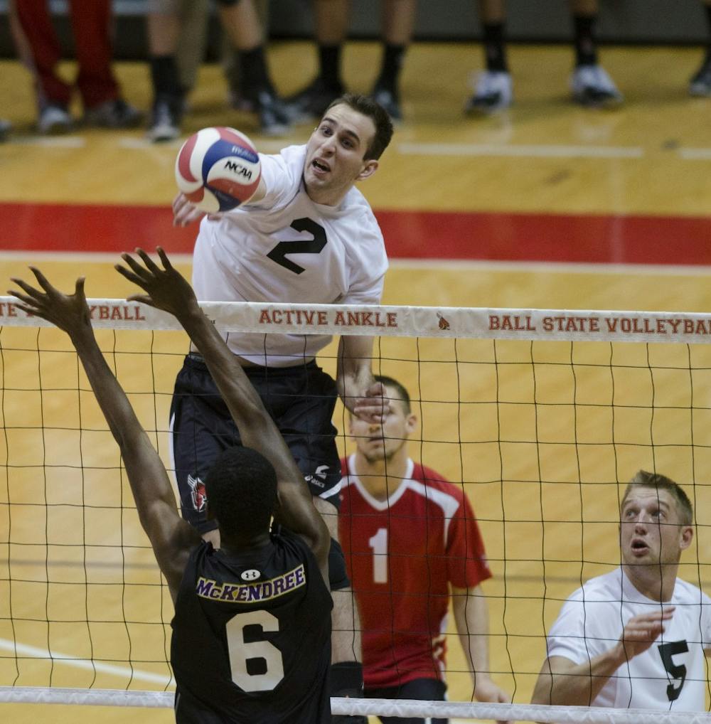 Senior middle attacker Matt Leske knocks the ball over the net in the first set against McKendree Jan. 24 at Worthen Arena. Leske had three digs. DN PHOTO BREANNA DAUGHERTY