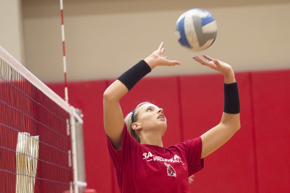 Junior Jenna Spadafora practices her setting during the team’s practice on Aug. 25. The setter is starting for the first time in her career this season, and looking forward to embracing her new role. DN PHOTO JORDAN HUFFER
