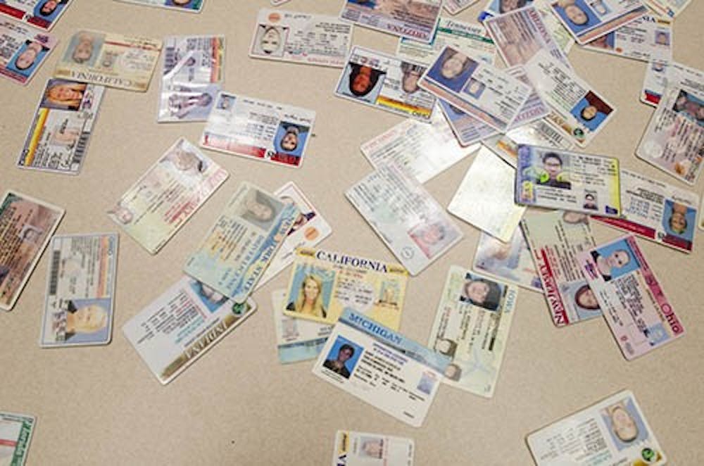 A table covered with fake ID