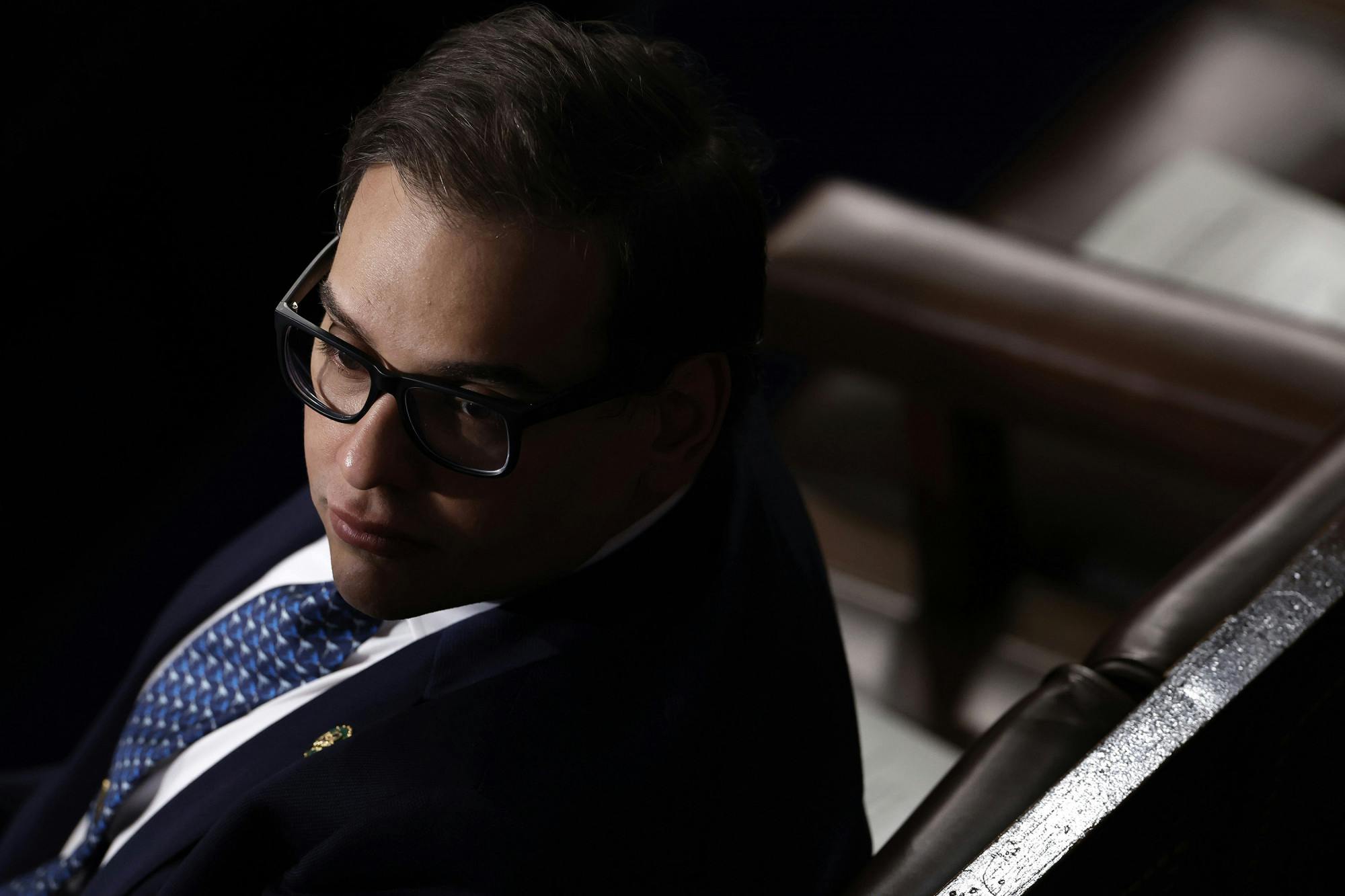 U.S. Rep. George Santos (R-NY) waits for the arrival of South Korean President Yoon Suk-yeol in the House Chamber of the U.S. Capitol on April 27, 2023, in Washington, D.C. Santos was charged Wednesday in a 13-count federal indictment with wire fraud, money laundering, theft of public funds and lying to Congress. (Anna Moneymaker/Getty Images/TNS)