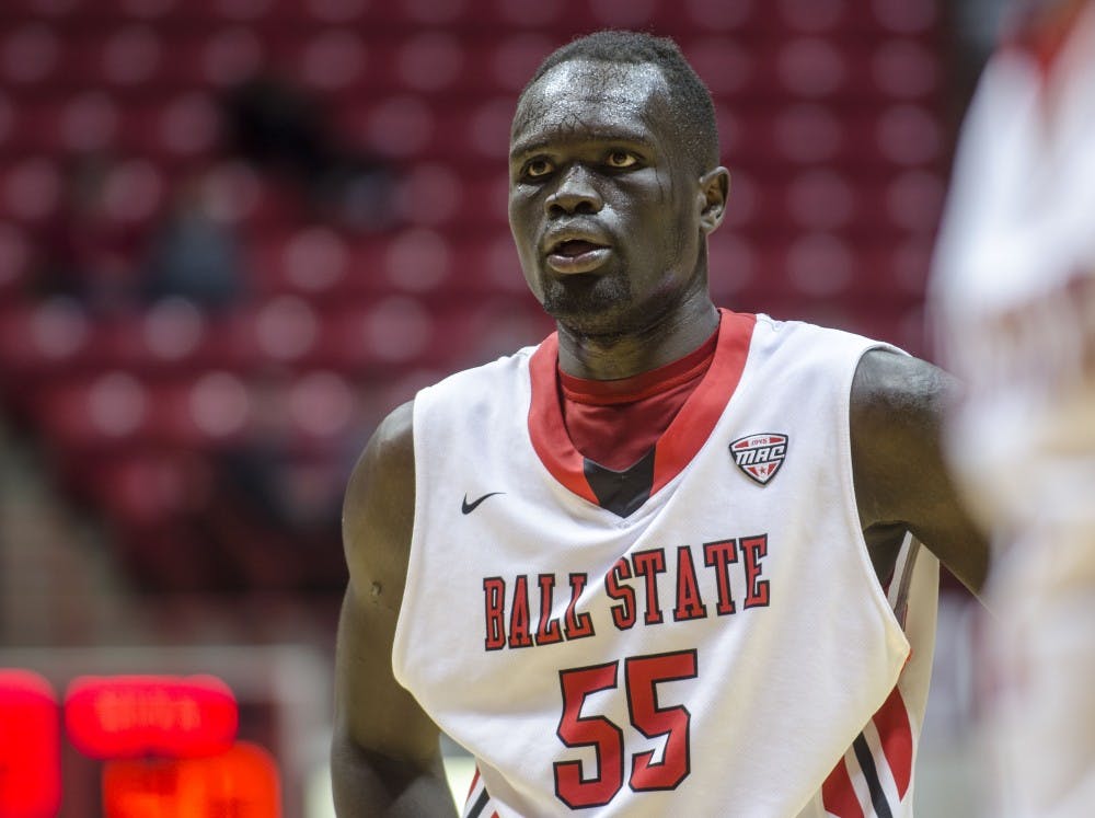 Senior center Majok Majok stands during a foul free throw against Ball State. The Cardinals are currently sitting at 4-13 overall and 1-5 in the Mid-American Conference. Majok leads the MAC in rebounds with 10.2 rebounds per game. DN PHOTO COREY OHLENKAMP