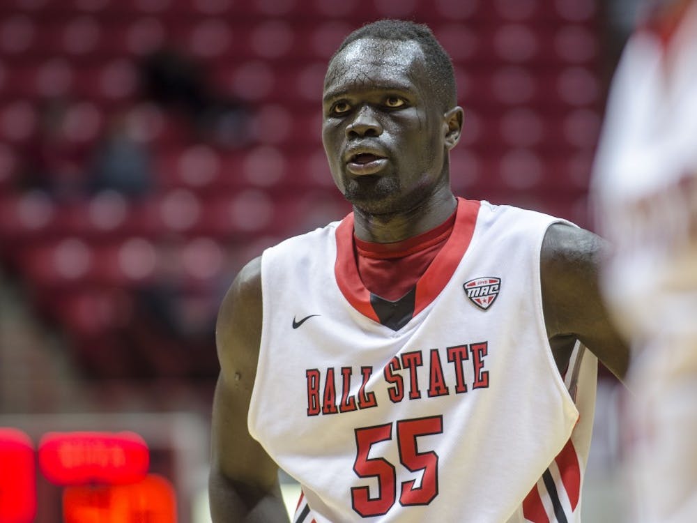 Senior center Majok Majok stands during a foul free throw against Ball State. The Cardinals are currently sitting at 4-13 overall and 1-5 in the Mid-American Conference. Majok leads the MAC in rebounds with 10.2 rebounds per game. DN PHOTO COREY OHLENKAMP