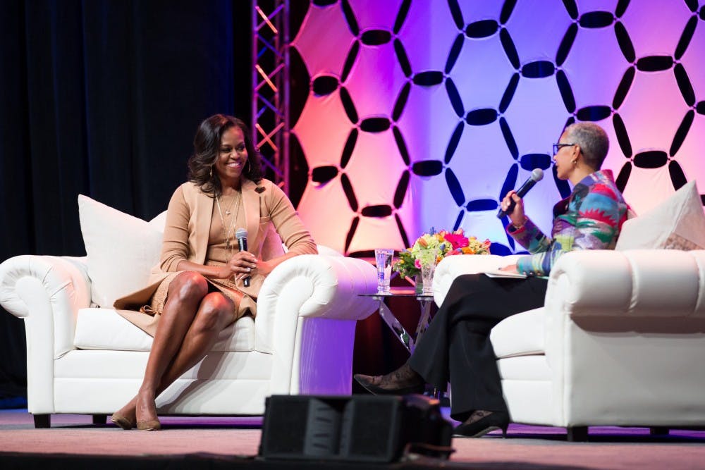 Former First Lady Michelle Obama speaks to moderator Alecia DeCoudreaux Feb. 13 at Bankers Life Fieldhouse in Indianapolis. More than 12,000 people attended the evening event. Daniel Arthur Jacobson, Photo Courtesy