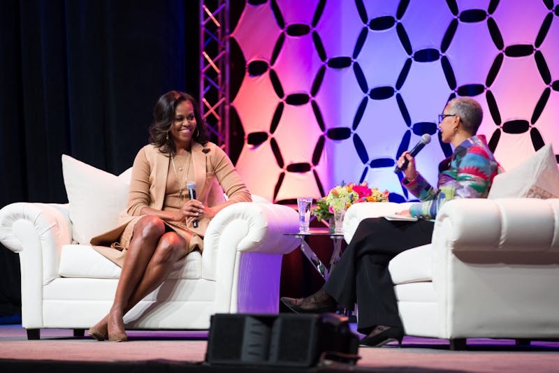 Former First Lady Michelle Obama speaks to moderator Alecia DeCoudreaux Feb. 13 at Bankers Life Fieldhouse in Indianapolis. More than 12,000 people attended the evening event. Daniel Arthur Jacobson, Photo Courtesy