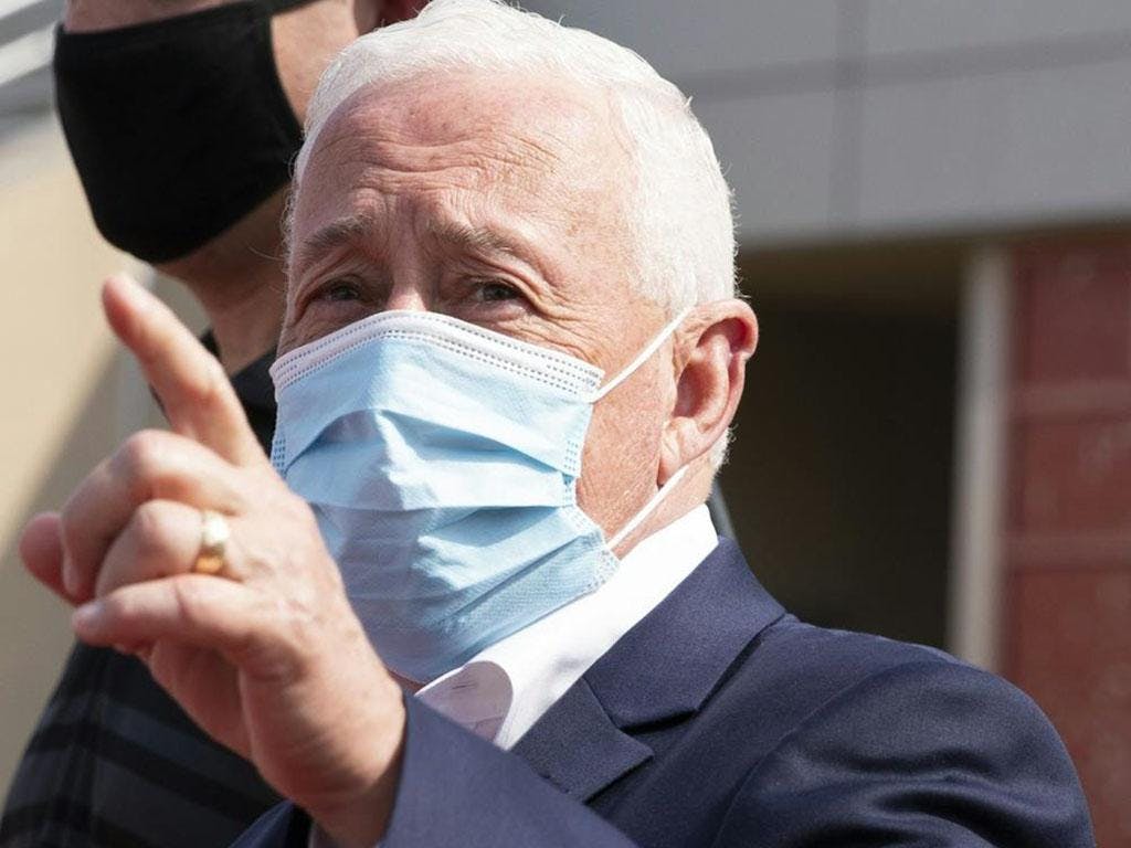 Greg Pence, U.S. Representative for Indiana’s sixth congressional district points up into the stands April 6, 2021, at Scheumann Stadium. Pence is the brother to former Vice President Mike Pence. Jacob Musselman, DN