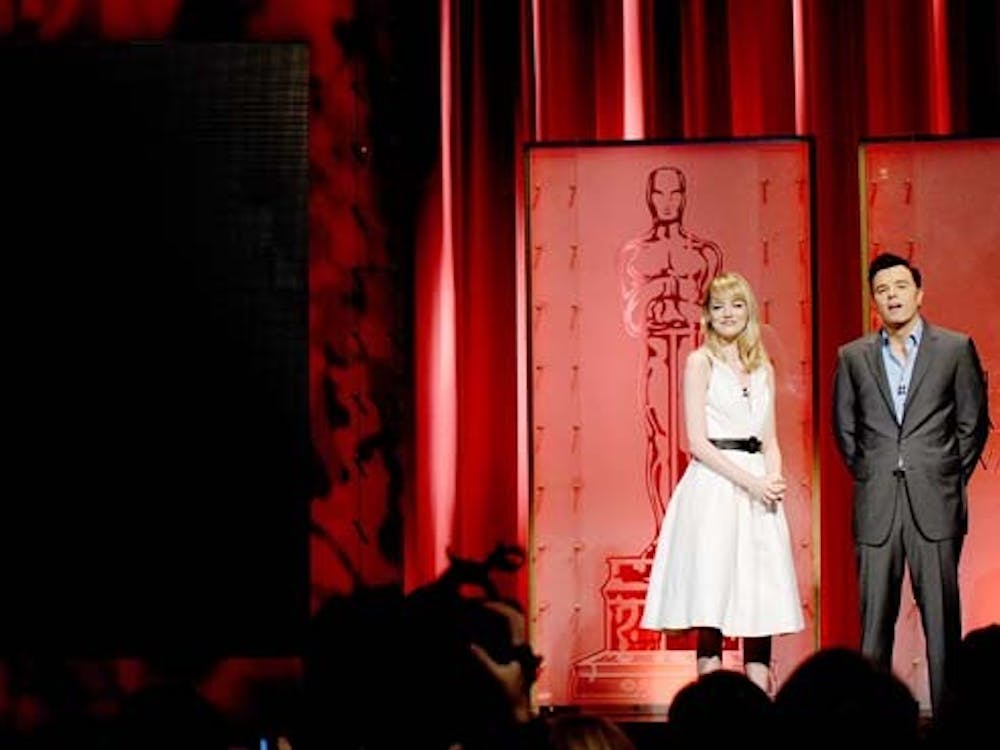 Emma Stone, left, and Seth MacFarlane announce the nominees at the 85th Academy Awards Nominations announcement at the AMPAS Samuel Goldwyn Theater, Thursday, January 10, 2013 in Beverly Hills, California. (Lionel Hahn/Abaca Press/MCT)