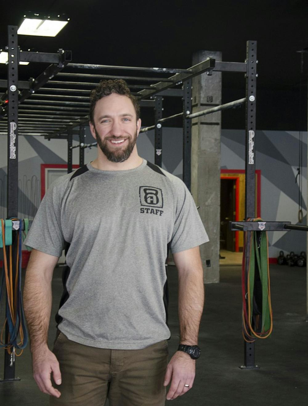 BJ McKay is the owner of The Arsenal in downtown Muncie. McKay prides his business on seven principles in the gym to promote a community feeling; loyalty, duty, respect/honor, selflessness, humility, integrity and positive action. DN PHOTO BREANNA DAUGHERTY