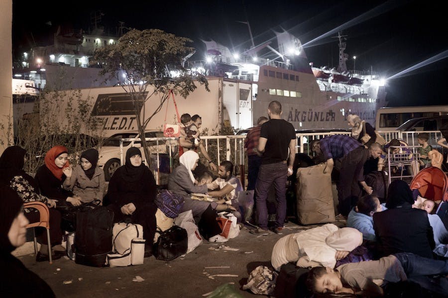 Syrian refugees at the port of Tripoli, Lebanon, waiting to board the ferry Lady Su, which travels to Tasucu, Turkey, in a twelve-hour journey. The ferry, which was scheduled to depart at 10 p.m. on September 21, left the port at 10 a.m. the following day due to regular delays and an truck accident during loading. (Gaia Squarci/McClatchy/TNS)