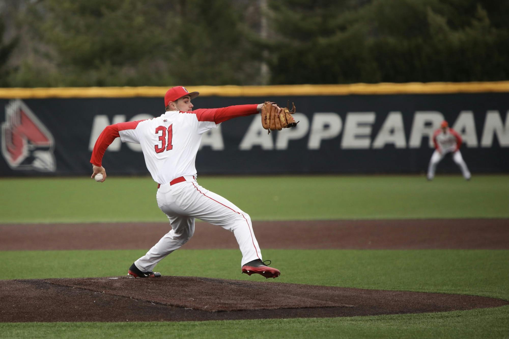 Freshman pitcher Tyler Schweitzer pitches the ball March 26, 2021, at First Merchants Ballpark Complex. The Cardinals won 7-6 against the Rockets. Rylan Capper, DN 
